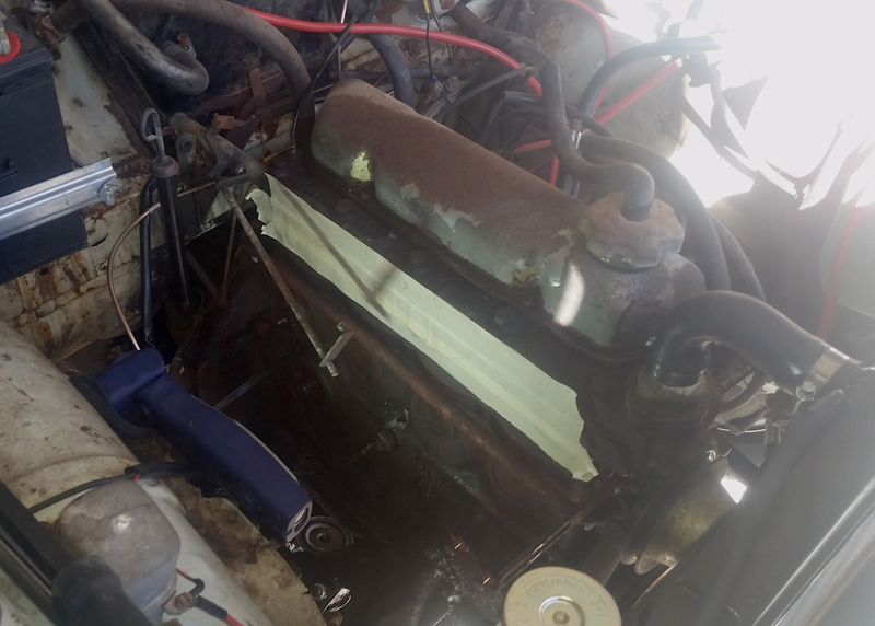 With the air-intake and headers removed (so that something better can be installed).